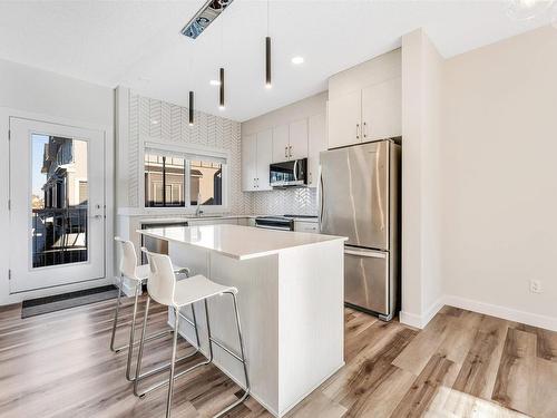 20 2215 24 Street Nw, Edmonton, AB - Indoor Photo Showing Kitchen With Stainless Steel Kitchen With Upgraded Kitchen