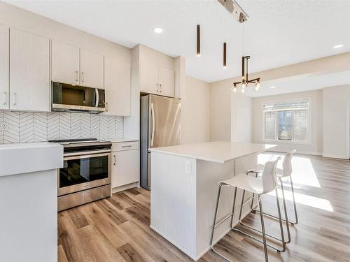 20 2215 24 Street Nw, Edmonton, AB - Indoor Photo Showing Kitchen With Stainless Steel Kitchen With Upgraded Kitchen