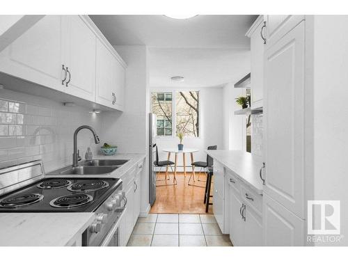 306 9816 112 Street, Edmonton, AB - Indoor Photo Showing Kitchen With Double Sink