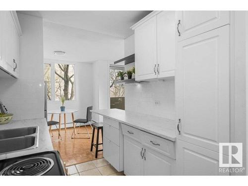 306 9816 112 Street, Edmonton, AB - Indoor Photo Showing Kitchen With Double Sink