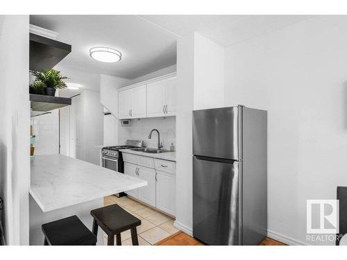 306 9816 112 Street, Edmonton, AB - Indoor Photo Showing Kitchen With Double Sink