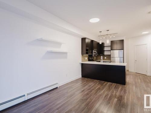 208 10418 81 Avenue, Edmonton, AB - Indoor Photo Showing Kitchen