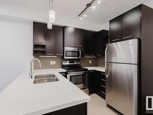 208 10418 81 Avenue, Edmonton, AB - Indoor Photo Showing Kitchen With Double Sink With Upgraded Kitchen