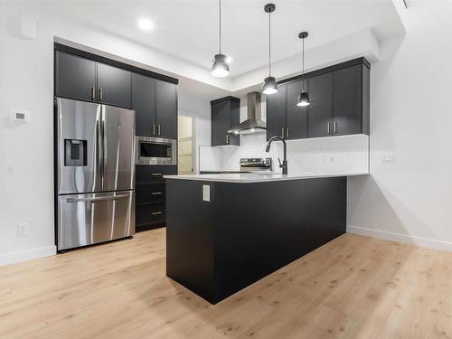 Edmonton, AB - Indoor Photo Showing Kitchen With Upgraded Kitchen