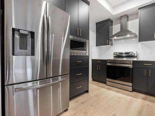 Edmonton, AB - Indoor Photo Showing Kitchen With Upgraded Kitchen