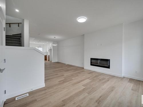 130 Castilian Boulevard, Sherwood Park, AB - Indoor Photo Showing Living Room With Fireplace