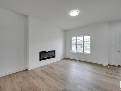 130 Castilian Boulevard, Sherwood Park, AB - Indoor Photo Showing Living Room With Fireplace