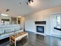 202 10809 Saskatchewan Drive, Edmonton, AB  - Indoor Photo Showing Living Room With Fireplace 