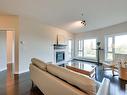 202 10809 Saskatchewan Drive, Edmonton, AB  - Indoor Photo Showing Living Room With Fireplace 