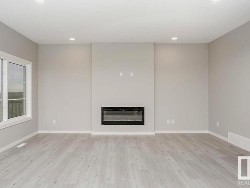 674 Kinglet Boulevard, Edmonton, AB - Indoor With Fireplace