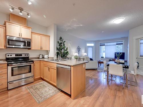 114 511 Queen Street, Spruce Grove, AB - Indoor Photo Showing Kitchen With Double Sink