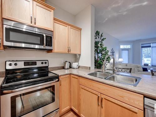 114 511 Queen Street, Spruce Grove, AB - Indoor Photo Showing Kitchen With Double Sink