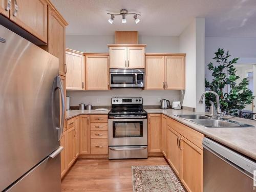 114 511 Queen Street, Spruce Grove, AB - Indoor Photo Showing Kitchen With Double Sink