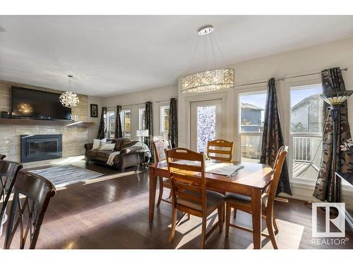 13827 142 Avenue, Edmonton, AB - Indoor Photo Showing Dining Room With Fireplace