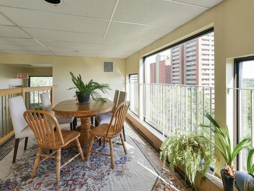 10 9734 111 Street, Edmonton, AB - Indoor Photo Showing Living Room With Fireplace