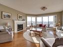 10 9734 111 Street, Edmonton, AB  - Indoor Photo Showing Living Room With Fireplace 