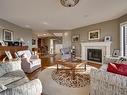 10 9734 111 Street, Edmonton, AB  - Indoor Photo Showing Living Room With Fireplace 