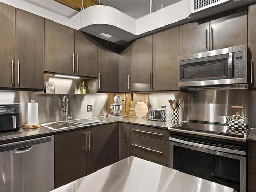 308 10169 104 Street, Edmonton, AB - Indoor Photo Showing Kitchen With Double Sink With Upgraded Kitchen