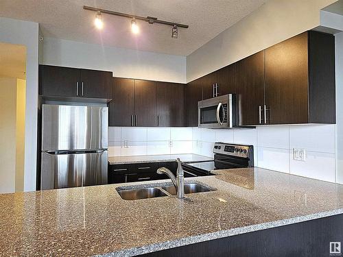 2505 10152 104 Street, Edmonton, AB - Indoor Photo Showing Kitchen With Stainless Steel Kitchen With Double Sink With Upgraded Kitchen