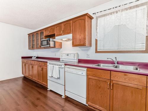 3561 53 Street, Wetaskiwin, AB - Indoor Photo Showing Kitchen With Double Sink