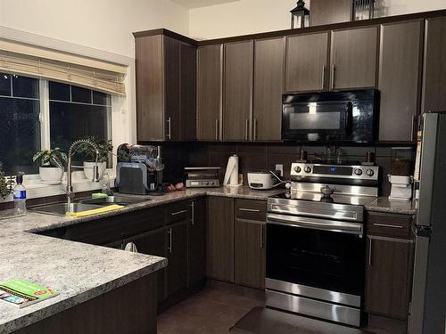 16 450 Mcconachie Way, Edmonton, AB - Indoor Photo Showing Kitchen With Double Sink