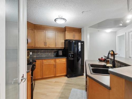 402 9020 Jasper Avenue, Edmonton, AB - Indoor Photo Showing Kitchen