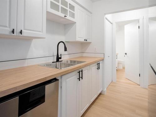 14847A Riverbend Road, Edmonton, AB - Indoor Photo Showing Kitchen With Double Sink