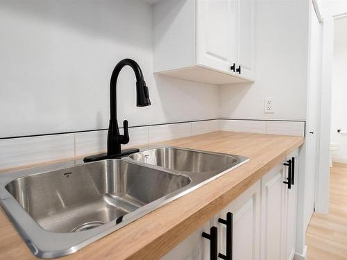 14847A Riverbend Road, Edmonton, AB - Indoor Photo Showing Kitchen With Double Sink