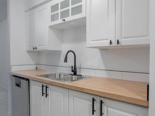 14847A Riverbend Road, Edmonton, AB - Indoor Photo Showing Kitchen With Double Sink