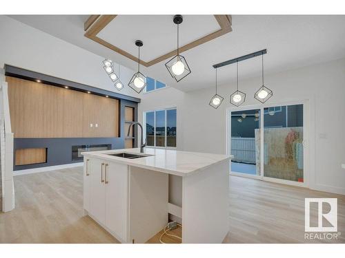 18 Sturtz Place, Leduc, AB - Indoor Photo Showing Kitchen With Double Sink