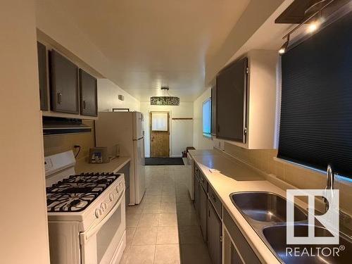 6316 105 Street, Edmonton, AB - Indoor Photo Showing Kitchen With Double Sink