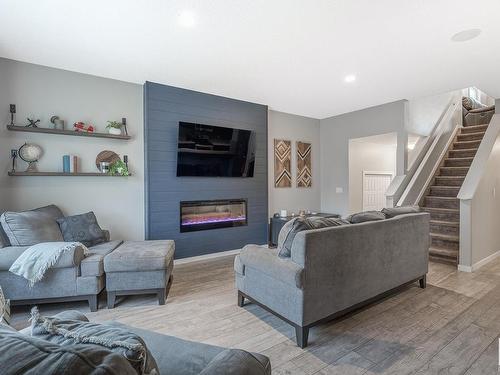 1239 Mcconachie Boulevard, Edmonton, AB - Indoor Photo Showing Living Room With Fireplace