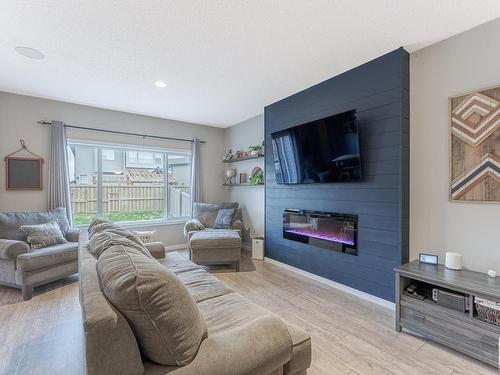 1239 Mcconachie Boulevard, Edmonton, AB - Indoor Photo Showing Living Room With Fireplace