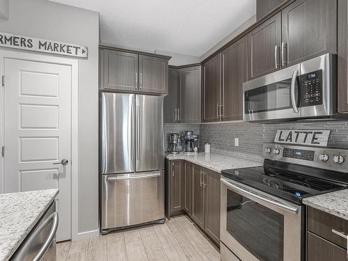 1239 Mcconachie Boulevard, Edmonton, AB - Indoor Photo Showing Kitchen