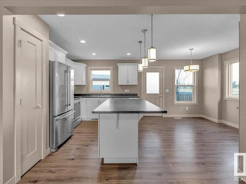 25 2121 Haddow Drive, Edmonton, AB - Indoor Photo Showing Kitchen With Double Sink