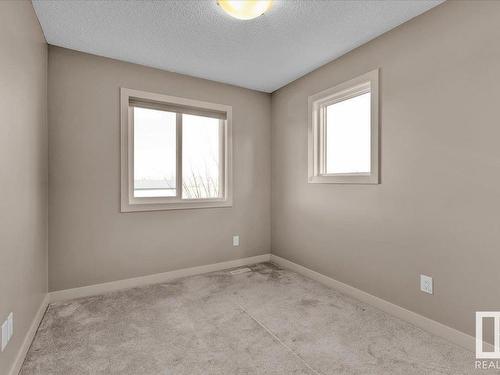 25 2121 Haddow Drive, Edmonton, AB - Indoor Photo Showing Other Room