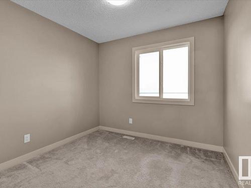 25 2121 Haddow Drive, Edmonton, AB - Indoor Photo Showing Other Room