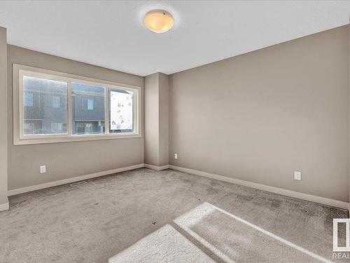 25 2121 Haddow Drive, Edmonton, AB - Indoor Photo Showing Other Room