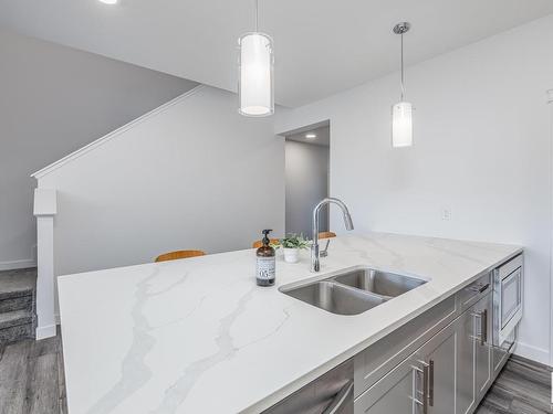 75 Redspur Drive, St. Albert, AB - Indoor Photo Showing Kitchen With Double Sink