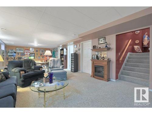 309-7001 Northview Drive, Wetaskiwin, AB - Indoor Photo Showing Living Room With Fireplace