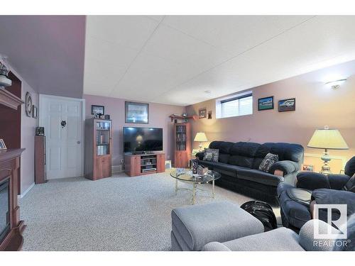 309-7001 Northview Drive, Wetaskiwin, AB - Indoor Photo Showing Living Room With Fireplace