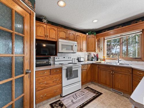 11415 9 Avenue, Edmonton, AB - Indoor Photo Showing Kitchen With Double Sink