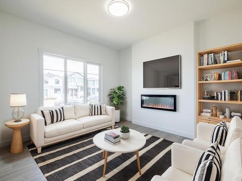 9339 221 Street, Edmonton, AB - Indoor Photo Showing Living Room With Fireplace