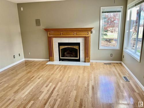 5909 43A Street, Vegreville, AB - Indoor Photo Showing Living Room With Fireplace