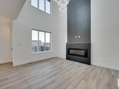 9 Pierwyck Loop, Spruce Grove, AB - Indoor Photo Showing Living Room With Fireplace