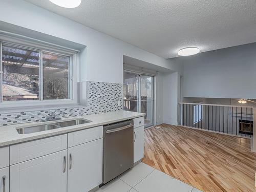 63 Alderwood Boulevard, St. Albert, AB - Indoor Photo Showing Kitchen With Double Sink