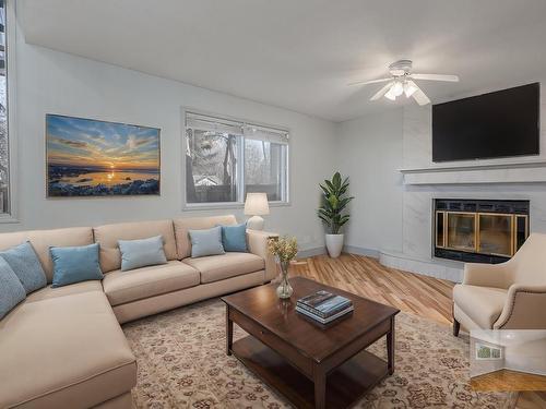 63 Alderwood Boulevard, St. Albert, AB - Indoor Photo Showing Living Room With Fireplace