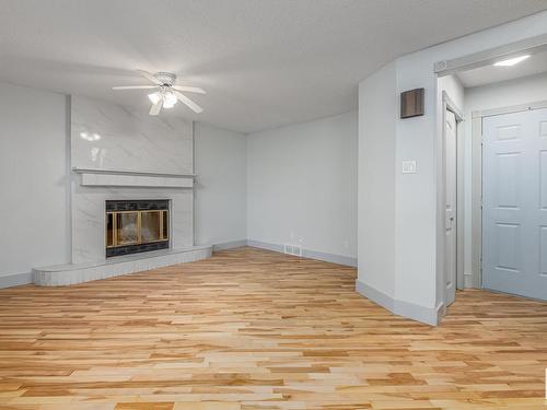 63 Alderwood Boulevard, St. Albert, AB - Indoor Photo Showing Living Room With Fireplace