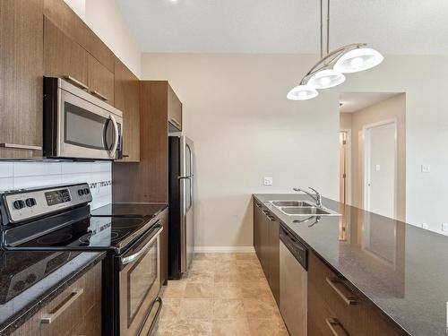 3423 9351 Simpson Drive, Edmonton, AB - Indoor Photo Showing Kitchen With Double Sink