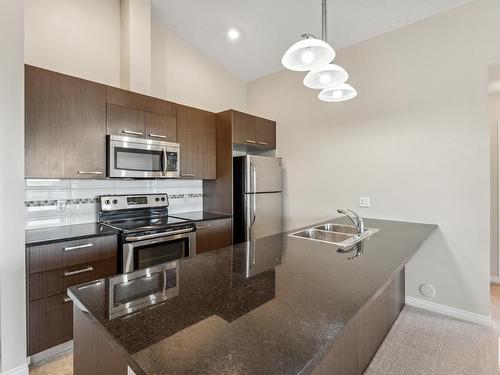 3423 9351 Simpson Drive, Edmonton, AB - Indoor Photo Showing Kitchen With Double Sink